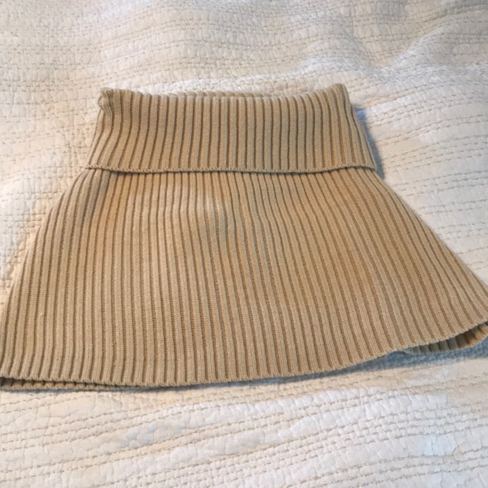 Cream colored knitted shoulder shrug